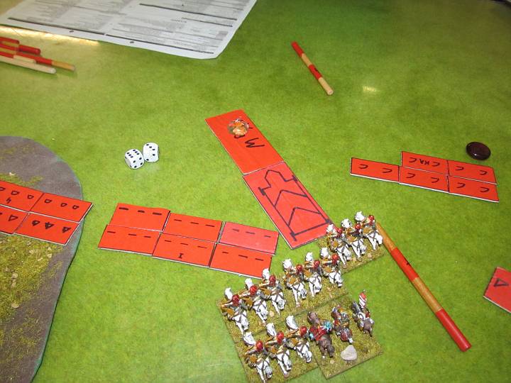 IMG_8966.JPG - Die Kampfwagen BG ist so auf verlorenem Posten, da sie nur mit zwei gegen vier Würfel würfelt. Kann das so sein? Erwartungsgemäß bricht sie, wird erreicht und dann entfernt, da nur mehr eine Base übrig ist.