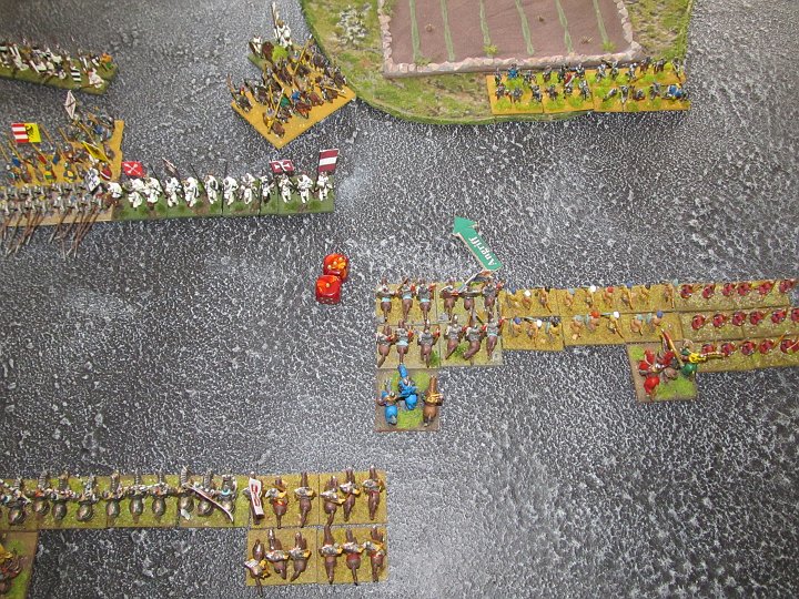 IMG_7990.JPG - Dann diese Situation. Die Lanzenreiter wollen hier nach vor, um sich in die Flanke der Ritter zu drehen, damit hier ein Vorteil für den Ritterkampf errungen werden kann. Sie benötigen bloß die 5 um stehenzubleiben. Der CMT geht auf....4.... Also Angriff gegen die Ritter!!